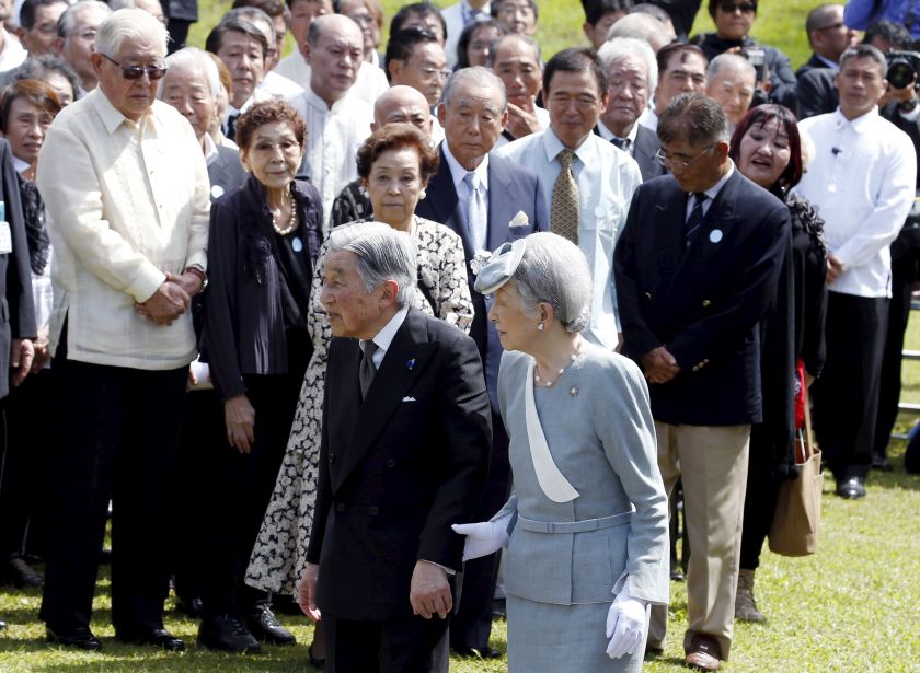 Japan's Emperor Akihito and Empress Michiko walk in front of relatives of Japanese soldiers who fought during World War 2 during a tribute at a memorial shrine in Cavinti, Laguna south of Manila January 29, 2016. u00e2u20acu2022 Reuters pic