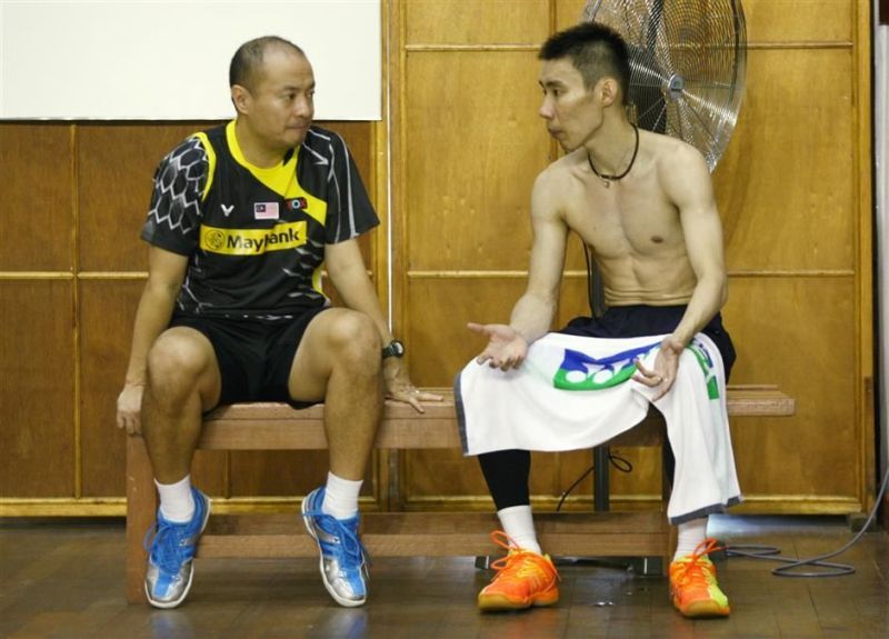 National badminton champion Datuk Lee Chong Wei (right ) with coach Hendrawan at training with the national squad at Juara Stadium May 1, 2015. Bernama pic