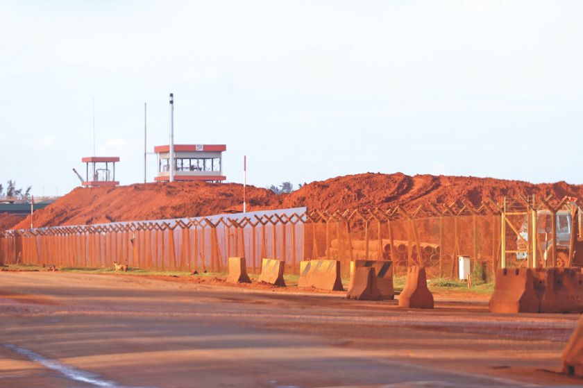 The clearing of massive stockpiles of bauxite at the Kuantan Port is the order of the day before the moratorium kicks in. u00e2u20acu201d Picture by Ahmad Zamzahuri