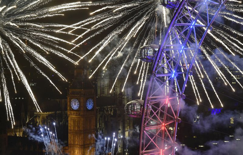 Fireworks explode around the London Eye wheel, the Big Ben clock tower and the Houses of Parliament to mark the beginning of the New Year in London, January 1, 2016. u00e2u20acu201d Reuters pic