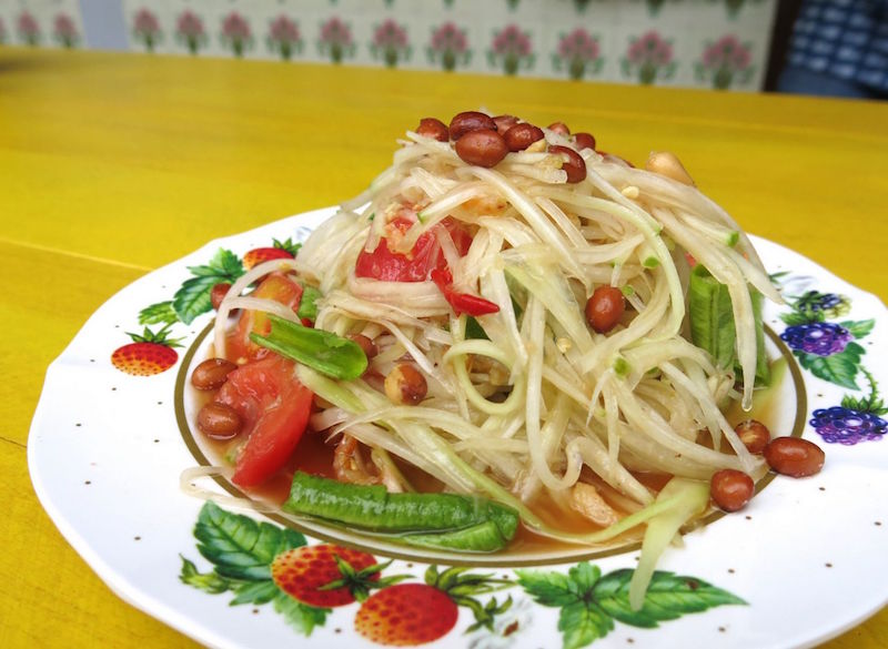 The delectably pungent green papaya is great with a little sticky rice. — TODAY pic