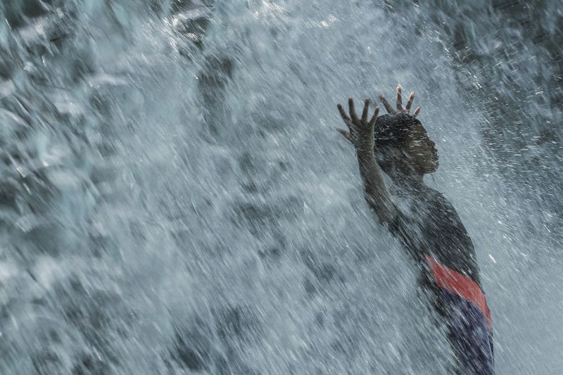 A young boy cools off at a public fountain in KLCC Park on a hot sunny day in Kuala Lumpur January 19, 2016. u00e2u20acu201d Picture by Yusof Mat Isa