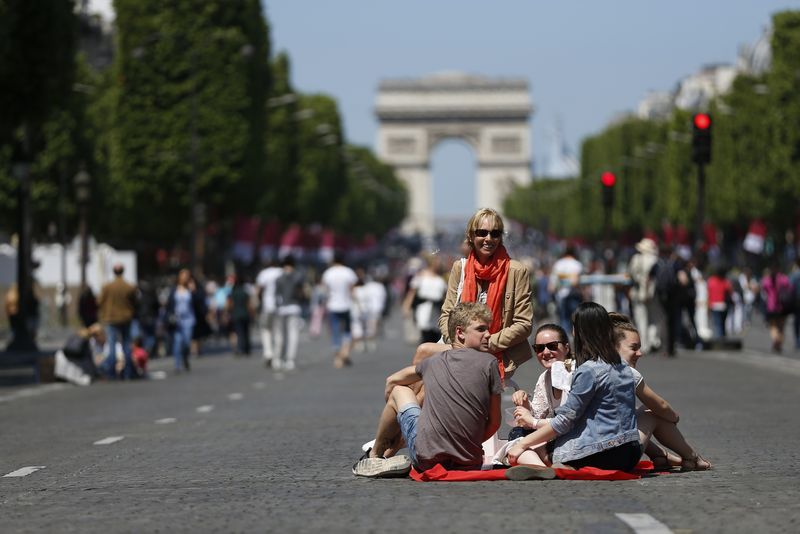 Starting April, Paris' famous avenue will be pedestrian one Sunday a month. u00e2u20acu201d AFP pic
