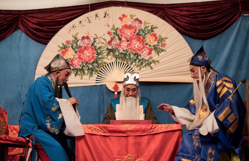 This picture taken on January 7, 2016 in Kunming shows actors performing during a show. — AFP pic