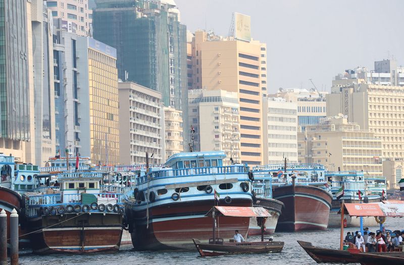 People travel in dhows, or traditional sailing vessels, at the Dubai Creek, UAE January 17, 2016.  u00e2u20acu201d Reuters pic