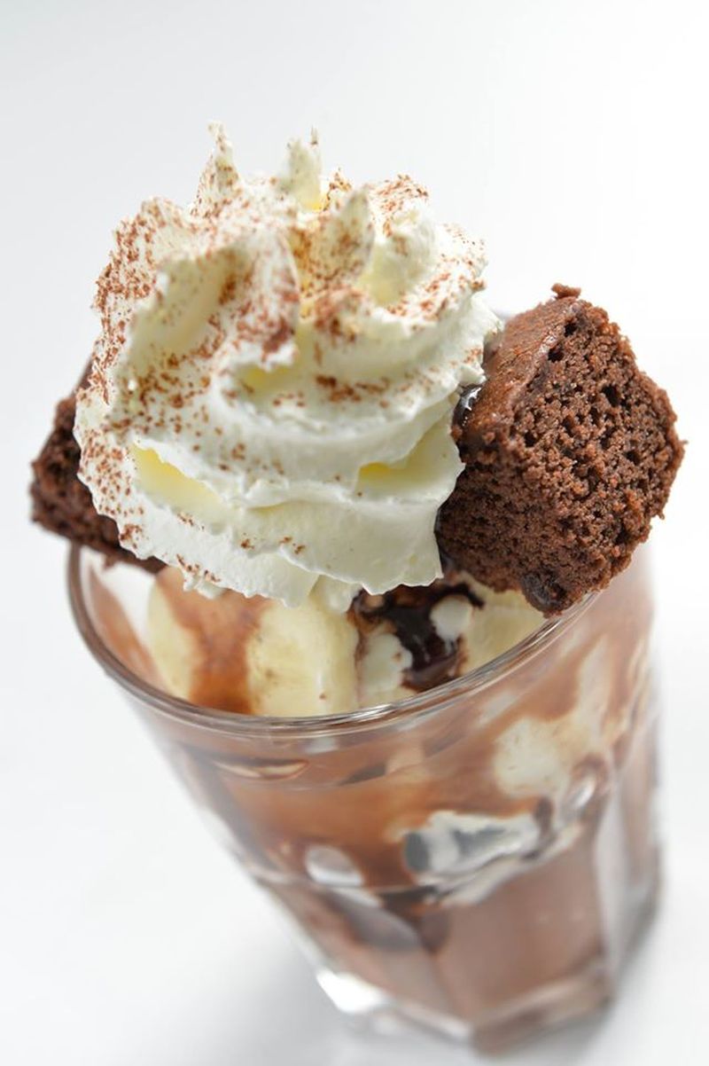 Desserts like this banana choc parfait with brownie, bananas, oreo crumbs and whipped cream will tempt you. 