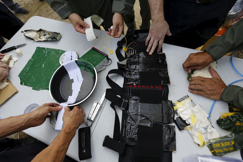Experts from the US Bureau of Alcohol, Tobacco, Firearms and Explosives prepare improvised explosive devices, which will be detonated during a course on blast scene investigation, near Hua Hin, Thailand January 17, 2016. u00e2u20acu201d Reuters pic