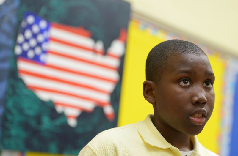 Jamar, an 'apprentice' at the Life Pieces to Masterpieces after school programme, speaks during an interview with Agence France-Presse on January 15, 2016 in Washington, DC. u00e2u20acu201d AFP picn