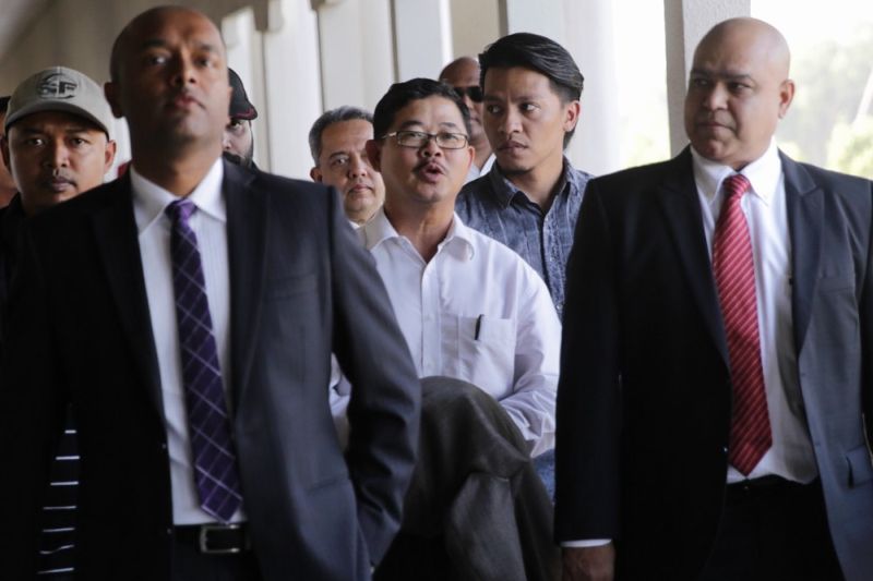 MACC to charge ex-KL CID chief Datuk Ku Chin Wah (centre), January 22, 2016. u00e2u20acu2022 Picture by Choo Choy May