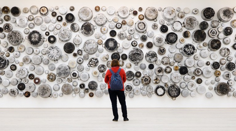 A visitor looks at an installation entitled ‘Untitled (Food For Thought series)’ by Maha Malluh, displayed in the Saatchi Gallery in London January 12, 2016. — AFP pic