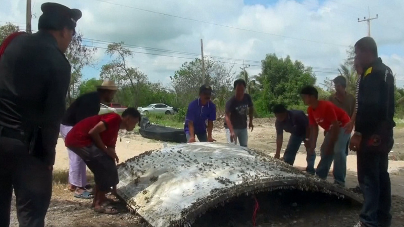 A piece of metal found off the coast of southern Thailand fuelled speculation that it could be from Malaysia Airlines Flight MH370. u00e2u20acu201d Reuters videograb