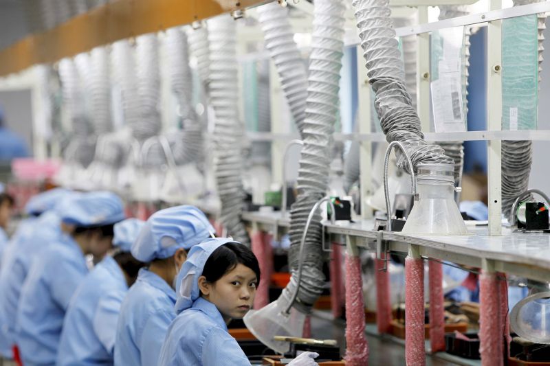 Production line in Suzhou Etron Electronics Co Ltdu00e2u20acu2122s factory in Suzhou, Jiangsu province, June 8, 2010. Chinau00e2u20acu2122s economic growth eased to 6.8 per cent in the fourth quarter from a year earlier, matching expectations. REUTERS/Aly Song/Files