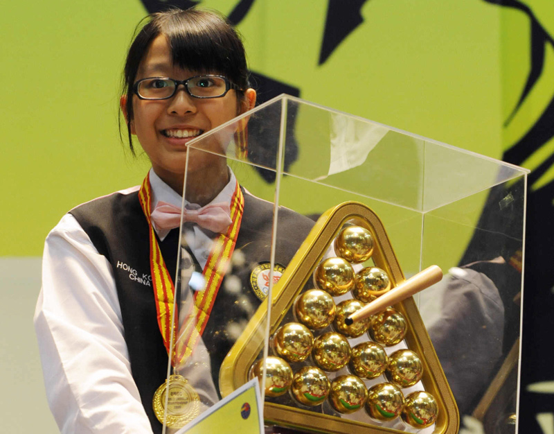 Ng On Yee of Hong Kong poses with the winners trophy after winning the women's title of the World Snooker championship held at the Hyderabad International Convention Centre (HICC) in Hyderabad on November 25, 2009. u00e2u20acu201d AFP pic