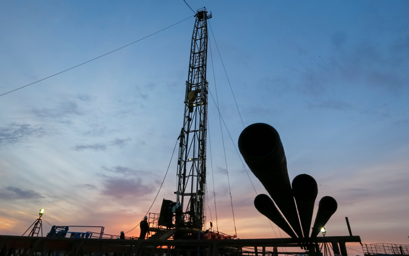 File picture shows a worker standing next to a tower for maintenance of an oil well on oil fields operated by a subsidiary of the KazMunayGas Exploration Production JSC in Kazakhstan, January 21, 2016. u00e2u20acu201d Reuters pic