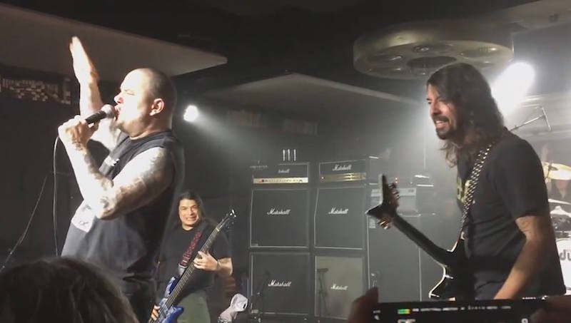 Phil Anselmo (left) had been performing Pantera covers with major stars including Foo Fighters frontman Dave Grohl (right) shortly before the incident. u00e2u20acu201d Picture via Facebook.com/Pantera
