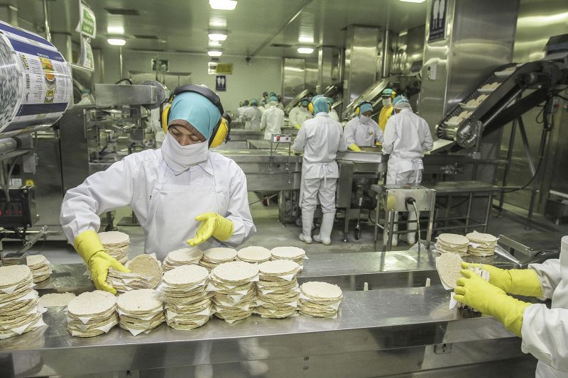 Workers at the Ramly Food Processing Centre in Kuala Lumpur, January 13, 2016. u00e2u20acu2022 Picture by Yusof Mat Isa