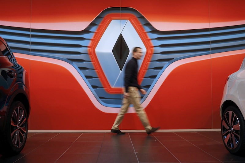 A man walks in front of a Renault logo at a dealership in Saint-Herblain near Nantes, January 19, 2016. u00e2u20acu201d Reuters pic