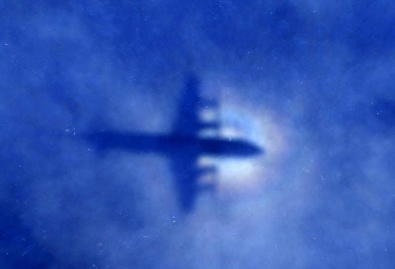 The shadow of a Royal New Zealand Air Force (RNZAF) P3 Orion maritime search aircraft can be seen on low-level clouds as it flies over the southern Indian Ocean looking for missing Malaysian Airlines flight MH370 in this March 31, 2014 file photo. u00e2u20acu201d Reu
