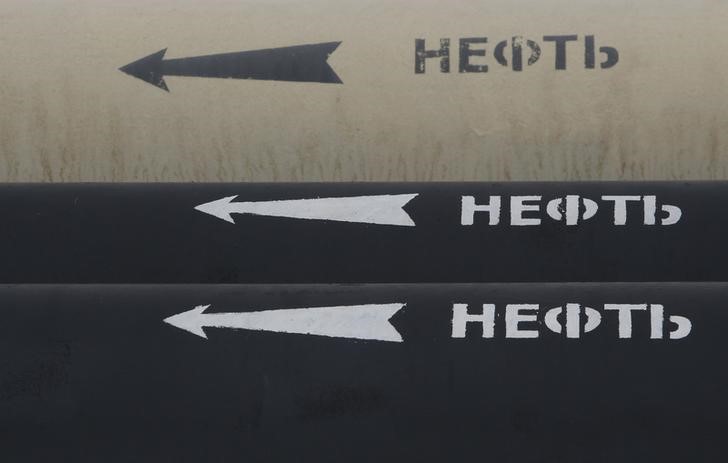 Pipes are pictured at an oil gathering facility owned by Bashneft company near the village of Shushnur, northwest from Ufa, Bashkortostan, January 28, 2015. The signs read 'Oil'. u00e2u20acu201d Reuters pic