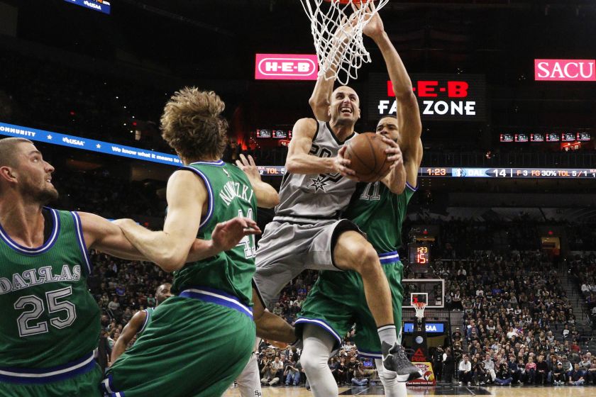 San Antonio Spurs shooting guard Manu Ginobili (20) shoots the ball as Dallas Mavericks center JaVale McGee (11) defends during the first half at AT&T Center. u00e2u20acu201d Reuters pic