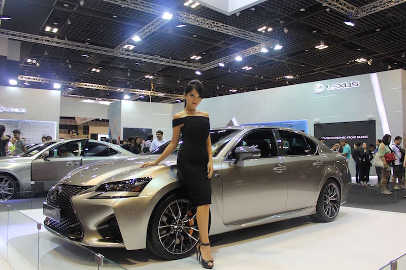 A model stands at the Lexus display area during the Singapore Motor Show 2016. u00e2u20acu201d TODAY pic