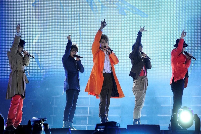 (From left) Members of Japanese pop music group SMAP Goro Inagaki, Takuya Kimura, Shingo Katori, Tsuyoshi Kusanagi, Masahiro Nakai perform during their concert in Beijing September 16, 2011. u00e2u20acu201d Reuters pic