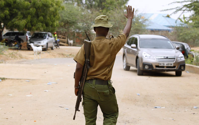 A police officer stops a car at the entrance of the Garissa University College as students return to the campus in Kenya's northeast town of Garissa, January 11, 2016. u00e2u20acu201d Reuters pic