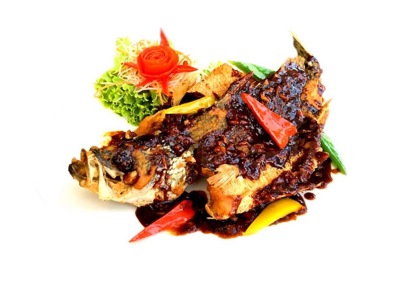 Black chilli sea bass is one of the cooked dishes Mookata House offers apart from Mookata. Its owner Christopher Tan also said he differentiates his restaurant from the rest by offering premium meats like kurobuta pork and wagyu beef as standard offerings. — TODAY pic