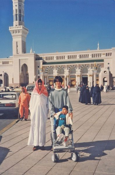 (From left) Tunku 'Abidin, Tunku Ali and Tunku Alif (in stroller) outside Masjid Nabawi in Medina in 1997.
