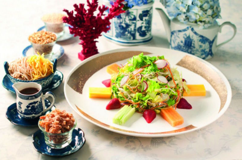 Talk about putting a twist on a classic: Min Jiang at One-North is serving a fruity lo hei with bacon and white truffle oil. — TODAY pic