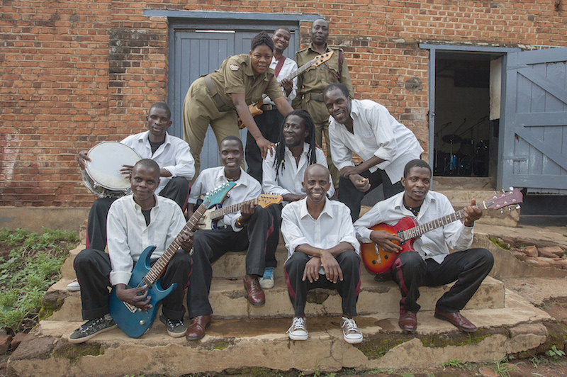 Members of Malawiu00e2u20acu2122s Zomba prison project band pose for a photograph outside the Central Prisonu00e2u20acu2122s makeshift music studio. u00e2u20acu201d AFP pic