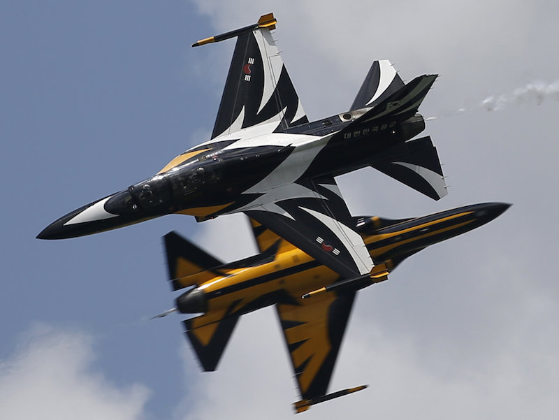 South Korea’s Black Eagles aerobatics team perform a manoeuvre during an aerial display on the opening day of the Singapore Airshow at Changi Exhibition Centre February 16, 2016. — Reuters pic