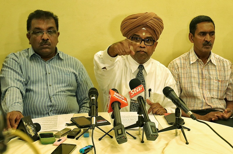 Pertubuhan Rapat Malaysia president A. Rajaretinam (centre) speaks to reporters during a press conference in Kuala Lumpur on February 17, 2016. u00e2u20acu201d Picture by Saw Siow Feng