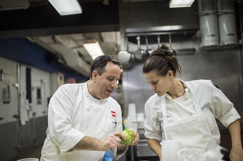 Carmen Quagliata (left), the Union Square Cafe chef who did the menu for Delta One, demonstrates meal preparations in New York, February 9, 2016. — Picture by Daniel Krieger/The New York Times