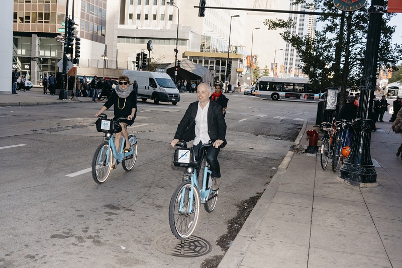 Iain Roberts, a partner at Ideo who has worked with Ford for a decade, rides a bicycle through the Divvy bike share program with employees in Chicago, in October, 2015. u00e2u20acu201d Picture by Ryan Lowry/The New York Times