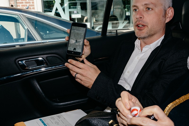 Iain Roberts, a partner at Ideo who has worked with Ford for a decade, rides in a Uber car in Chicago, in October, 2015. — Picture by Ryan Lowry/The New York Times