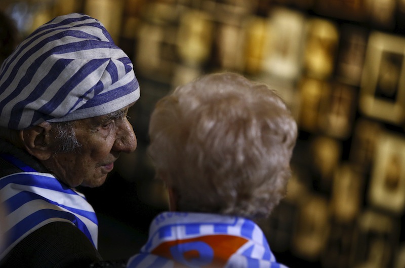 Survivors Miroslaw Celka and Janina Reklajtis attend a ceremony in the former Nazi German concentration and extermination camp Auschwitz-Birkenau in Oswiecim, Poland January 27, 2016. u00e2u20acu201du00c2u00a0Reuters pic