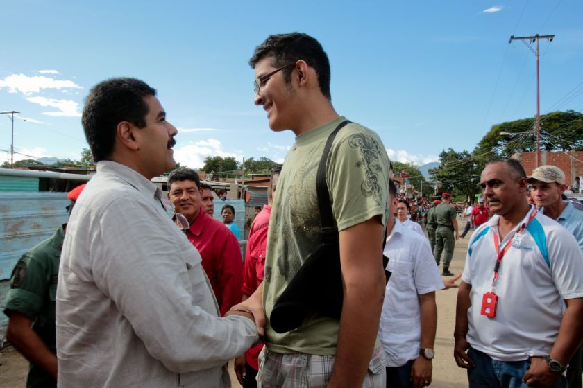 Venezuelan President Nicolas Maduro (left) is pictured shaking hands with Jeison Orlando Rodriguez. u00e2u20acu201d AFP pic
