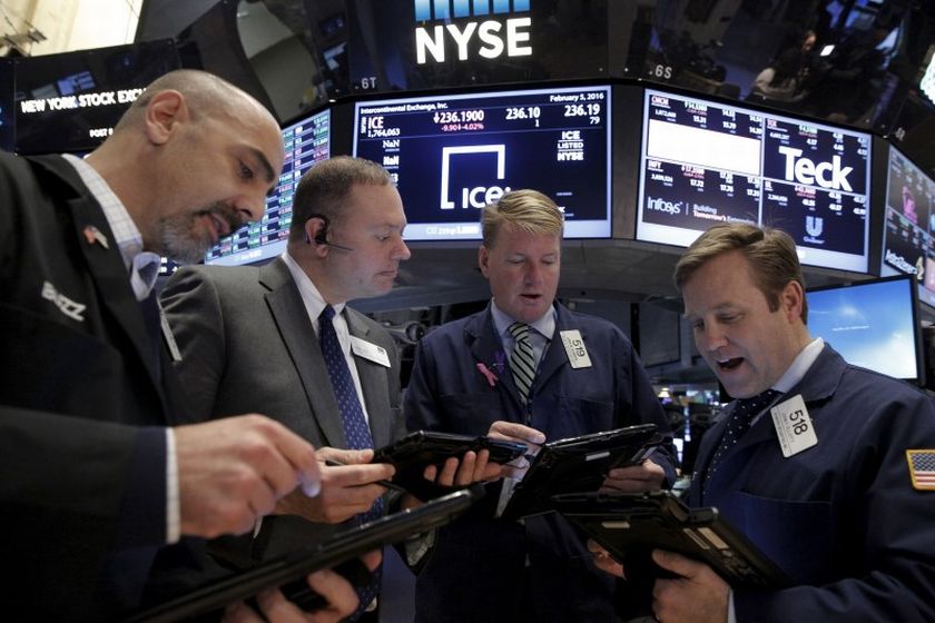 Traders work with a floor official (2nd left) on the floor of the New York Stock Exchange (NYSE) February 8, 2016. u00e2u20acu201d Reuters pic 
