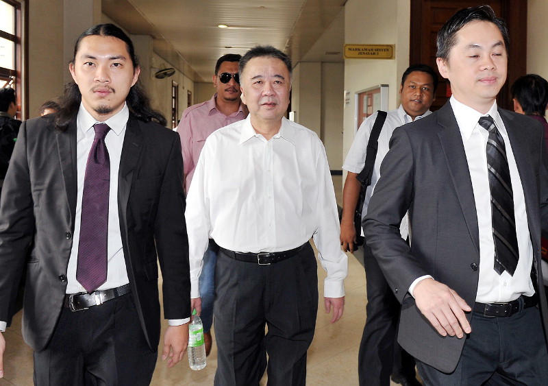 Former Executive Chairman of Repco Holdings Berhad, Low Thiam Hock, 54, known as 'Repco Low' (centre) was sentenced to five years in prison and fined RM5 million by the Kuala Lumpur Session Court, Feb 29, 2016. u00e2u20acu201d Bernama pic