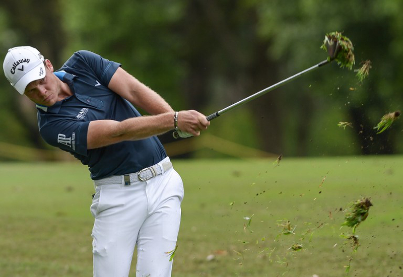 Danny Willet of England plays a shot during the first round of the 2016 Maybank Malaysia Championship golf tournament in Kuala Lumpur on February 18, 2016. u00e2u20acu201d AFP pic