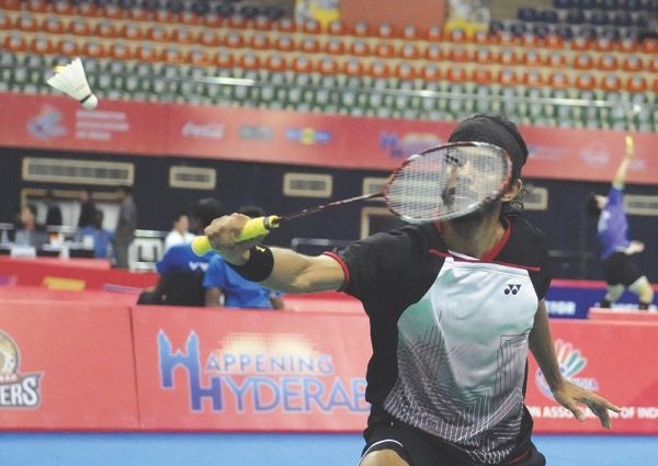 Ajay Jayaram of India plays a shot to Wang Zhengming. The Indian won 22-20, 15-21, 21-18 to help his team to a surprise 3-2 victory in the Asia Team badminton championship in Hyderabad. u00e2u20acu201d AFP pic