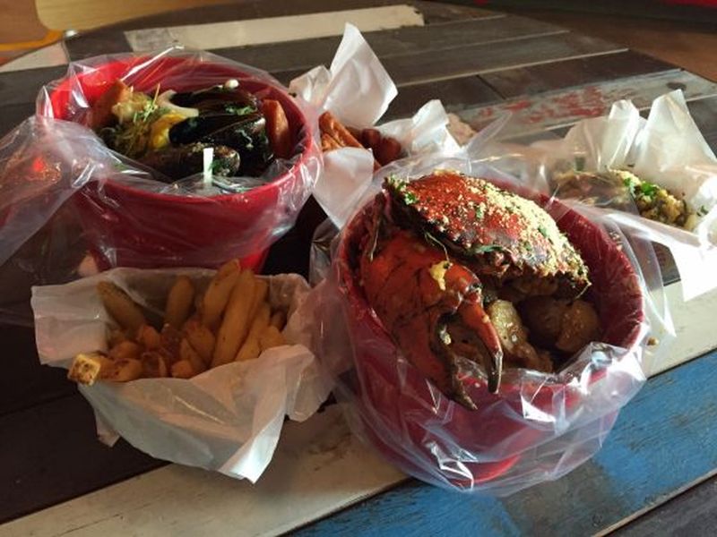 Just some of Cajun On Wheel's signature seafood boil must-haves. ― TODAY pic
