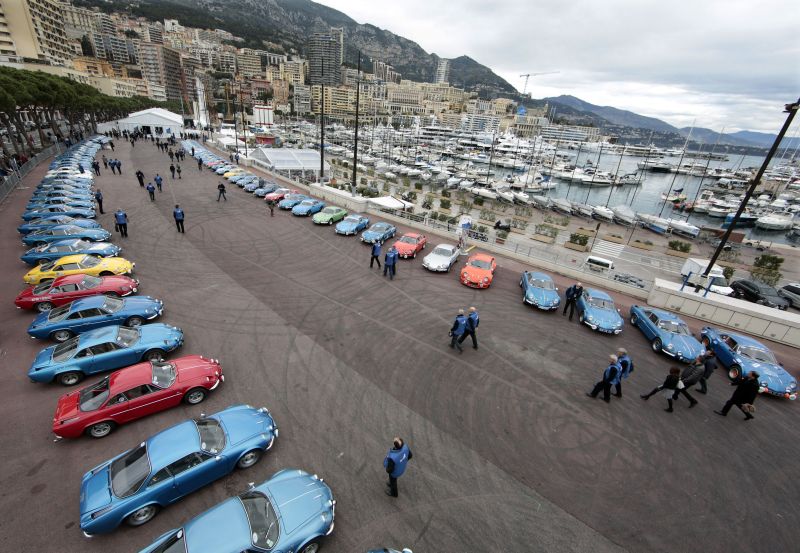 Vintage Alpine Renault cars line up in front of the Monaco harbour before the presentation of Renaultu00e2u20acu2122s new Alpine sports concept car u00e2u20acu02dcVisionu00e2u20acu2122 in Monaco February 16, 2016. REUTERS/Eric Gaillard