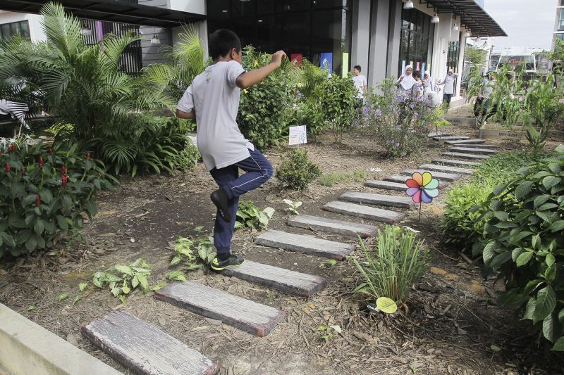 A student hops in the garden at Idrissi School on January 26, 2016. ― Picture by Yusof Mat Isa