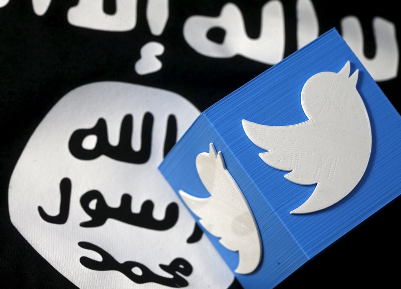 A 3D printed logo of Twitter and an Islamic State flag are seen in this picture illustration taken February 18, 2016. u00e2u20acu201d Reuters pic