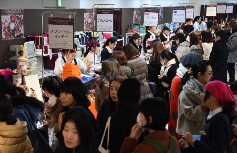 Women crowd around chocolate counters at the Printemps department store in Tokyo on February 9, 2016, before Valentine's Day on February 14. u00e2u20acu2022 AFP pic