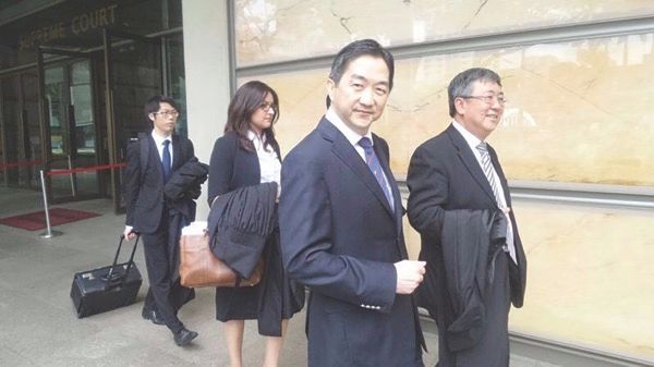 Soh (forefront) with his legal team. — Malay Mail pic