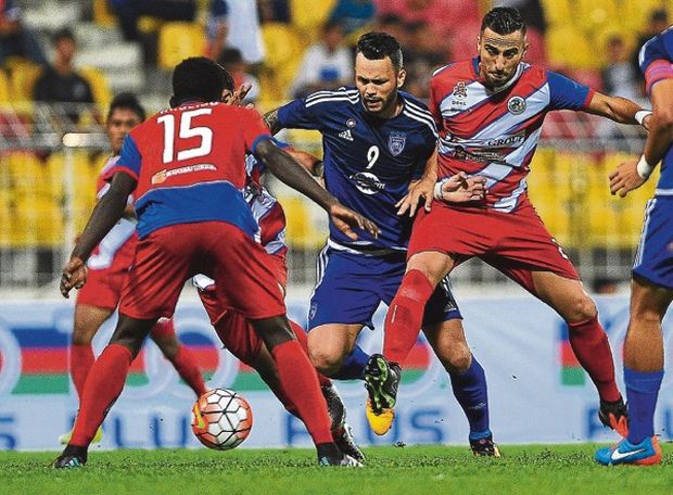 Rangel is surrounded by Kuala Lumpur players during their match on Monday. The striker limped off injured and faces a spell on the sidelines. u00e2u20acu201d Picture by Firdaus Latif