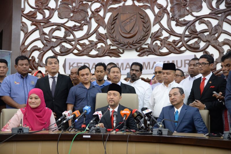 Datuk Seri Mukhriz Mahathir (seated, centre) announces his resignation as Kedah mentri besar in Alor Setar, Kedah, February 3, 2016. u00e2u20acu2022 Picture by KE Ooi
